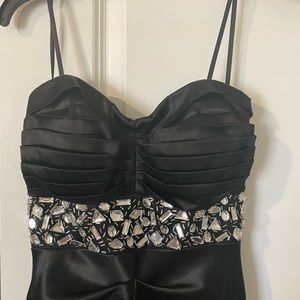 Prom Dress.    Beautiful black prom dress with rhinestones around the bodice.